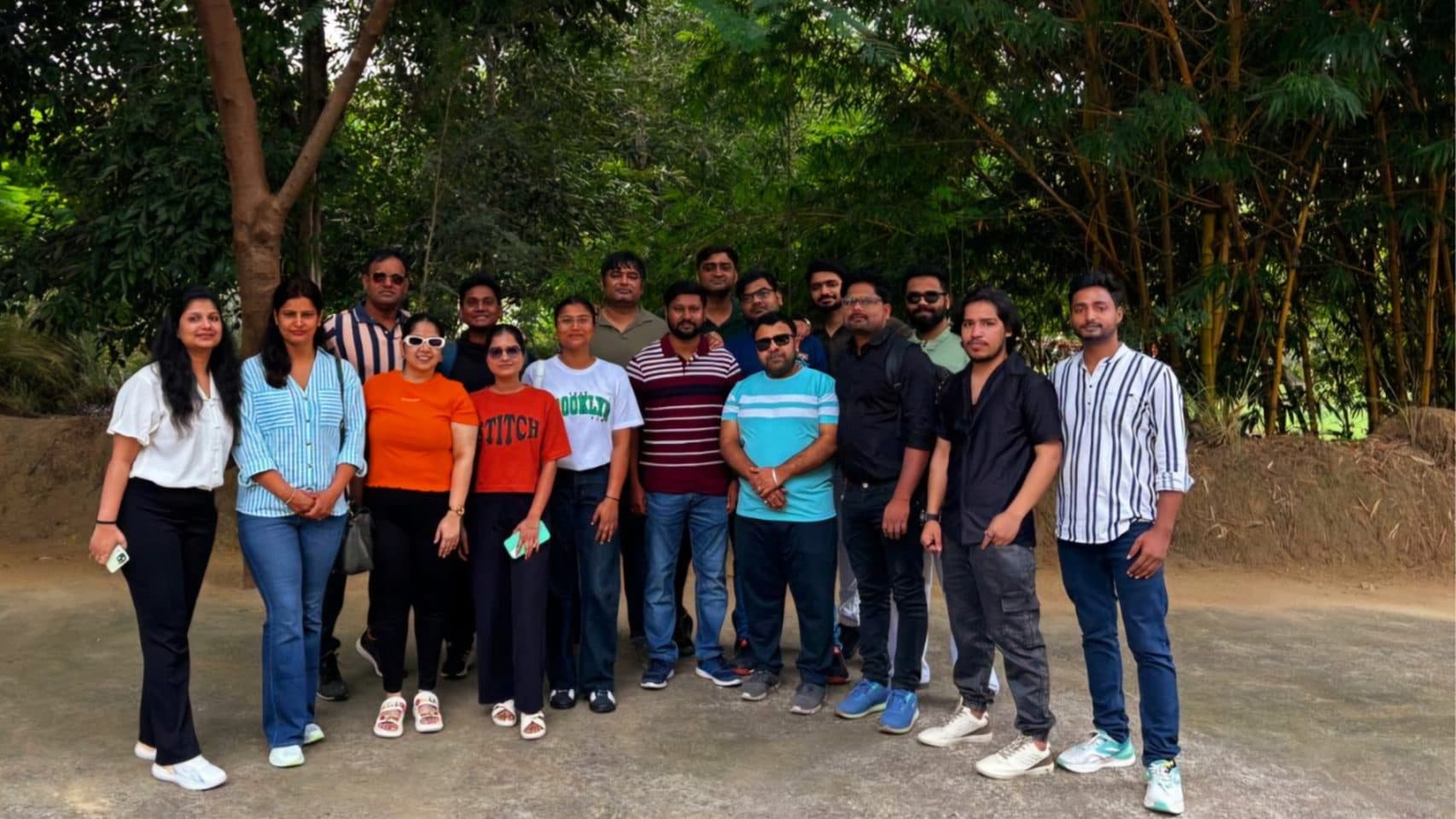 The Insights Curry team posing under the trees